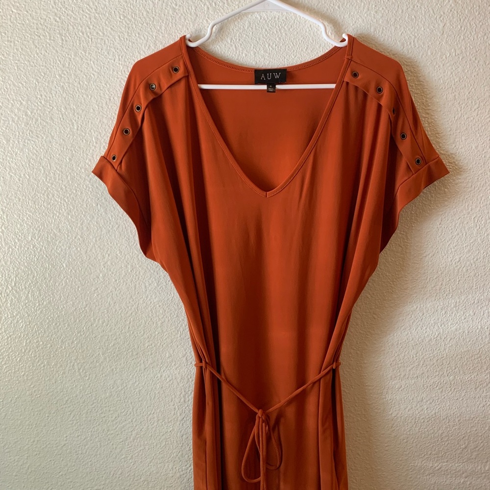 A U W pretty silky blouse. Good condition.